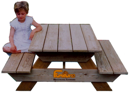 Child sized picnic table with child sitting
